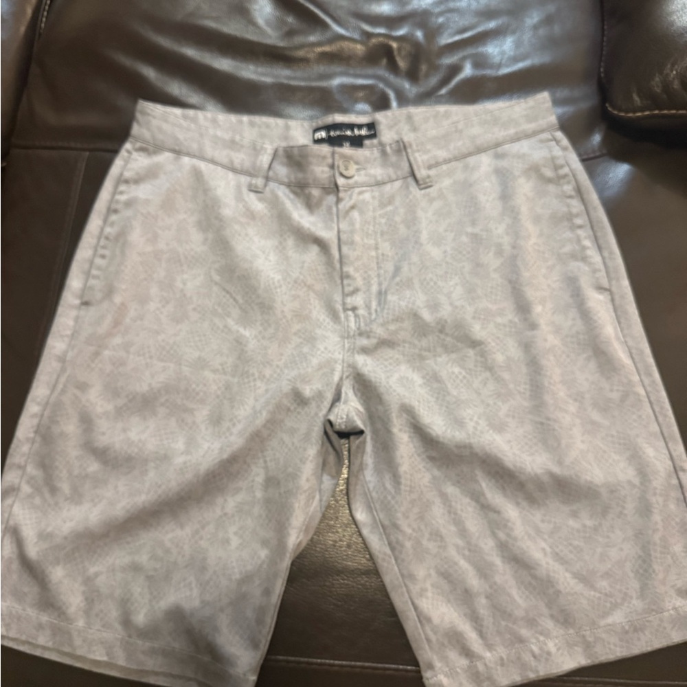 Travis Mathew shorts with pineapples.
